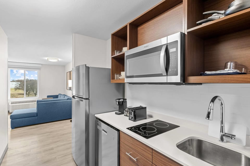 Superior Suite, 1 King Bed, Non Smoking | Desk, laptop workspace, blackout drapes, iron/ironing board