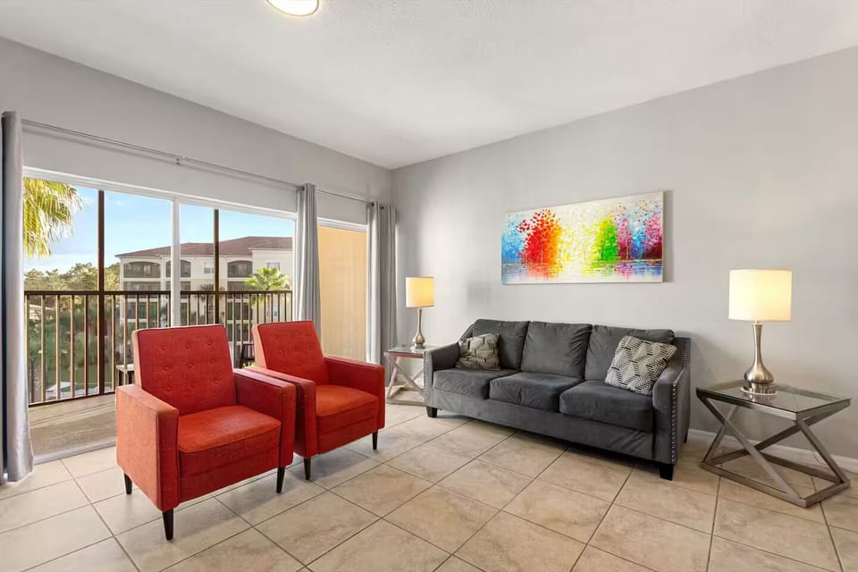 Bright open living room with plenty of seating - perfect for relaxing!