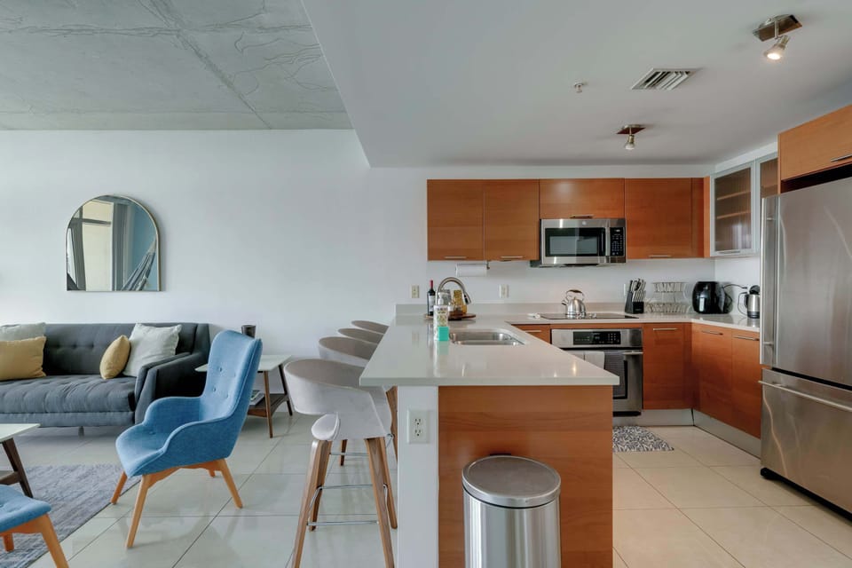 An open, connected layout that brings the living room and kitchen together for effortless living.