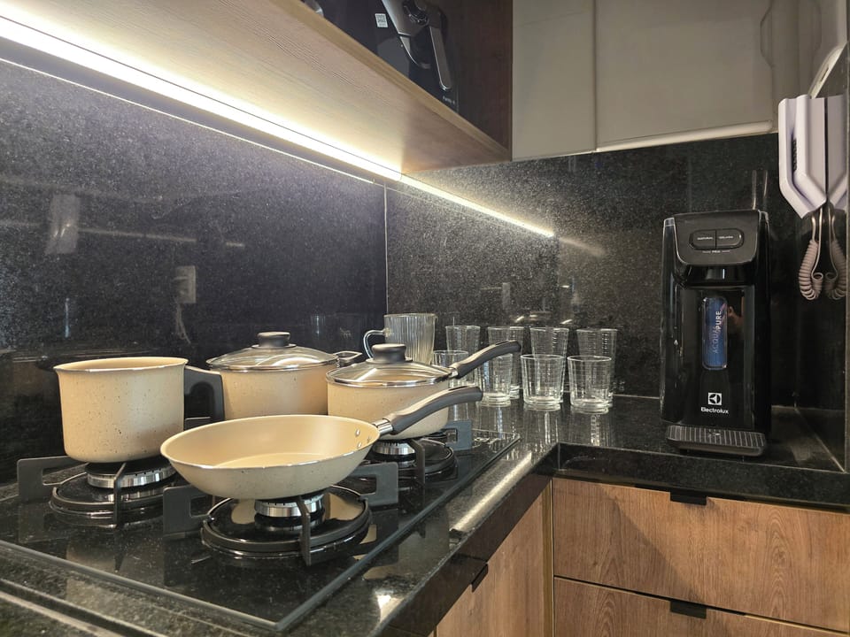 Apartment | Private kitchen | Electric kettle, dining tables