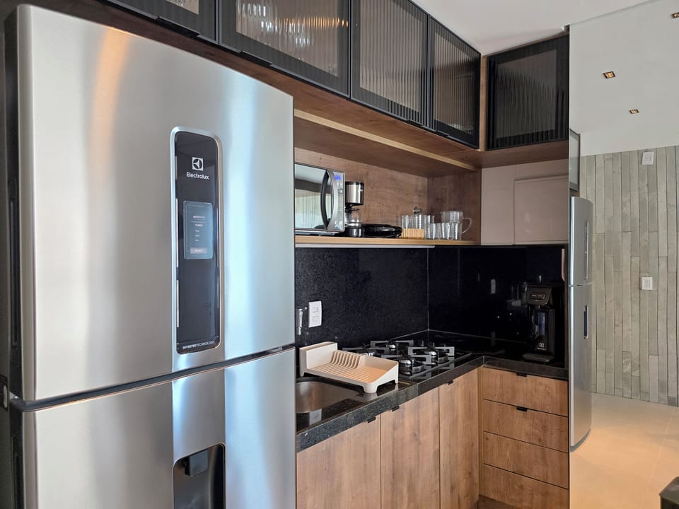 Apartment | Private kitchen | Electric kettle, dining tables
