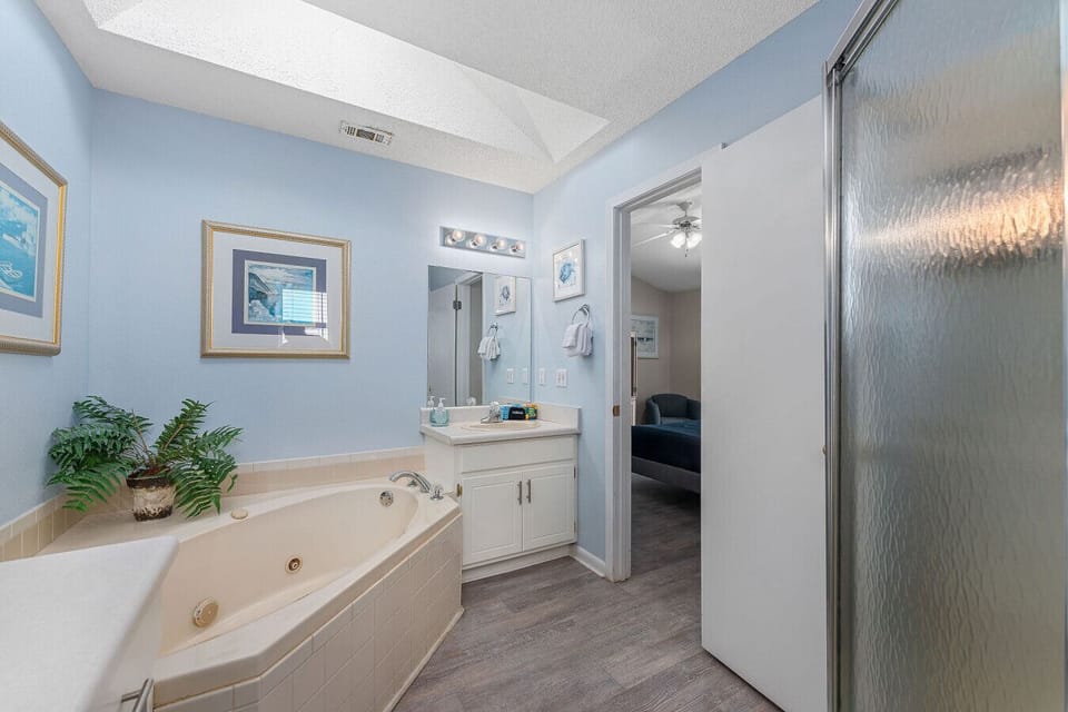 Full Bathroom 1 | Soaking Tub, Separate Shower & Bright Vanity