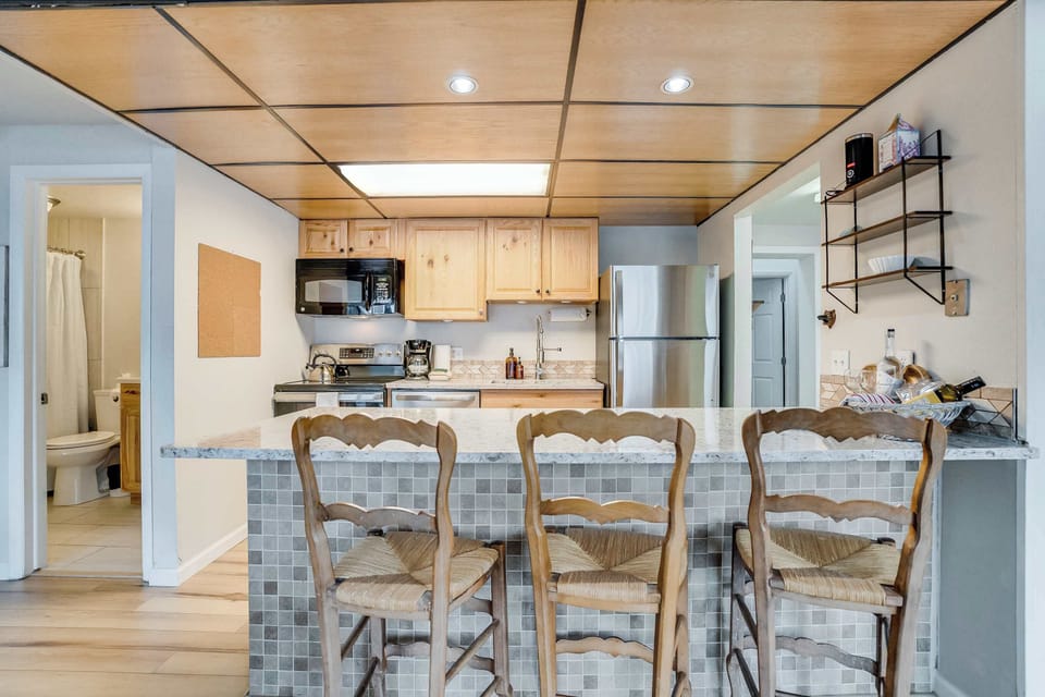 The kitchen at Heis Haus features brand new appliances with air fryer added 2025, updated counters, fresh paint, every type of coffee you can imagine, and more!  Arrive to our curated guest swag bags and escape to Heis!