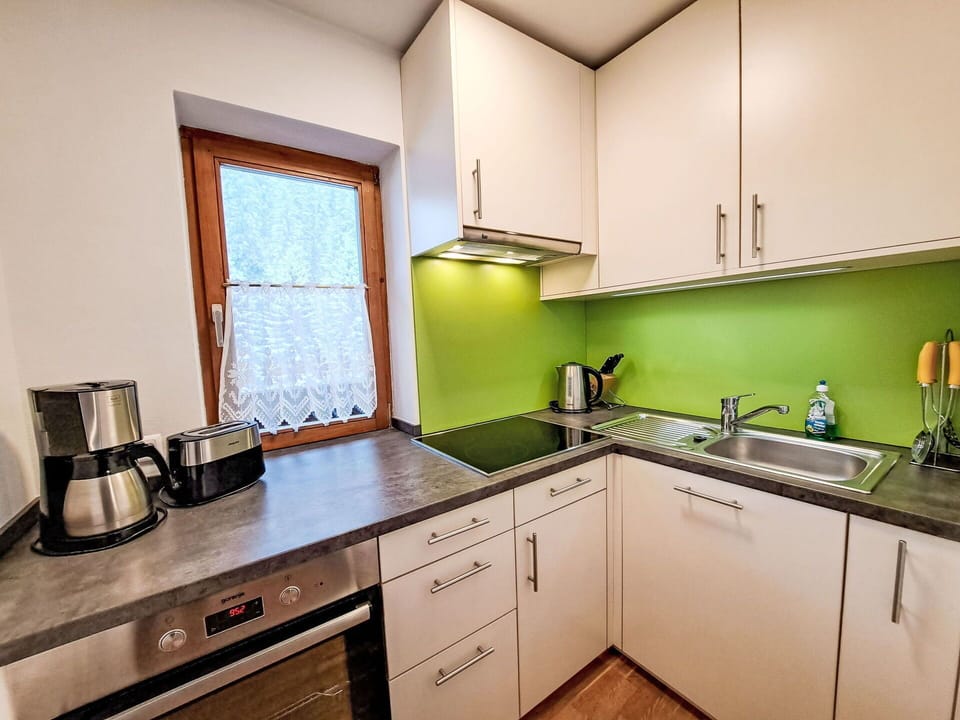 Flooring, Interior Design, Kitchen, Floor, Home, Furniture, Countertop, Kitchen Sink, Room, Cabinetry