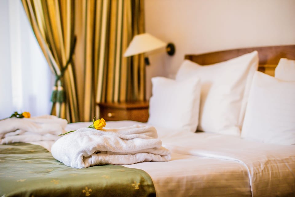 Deluxe Double Room (Castle View) | Minibar, in-room safe, desk, iron/ironing board