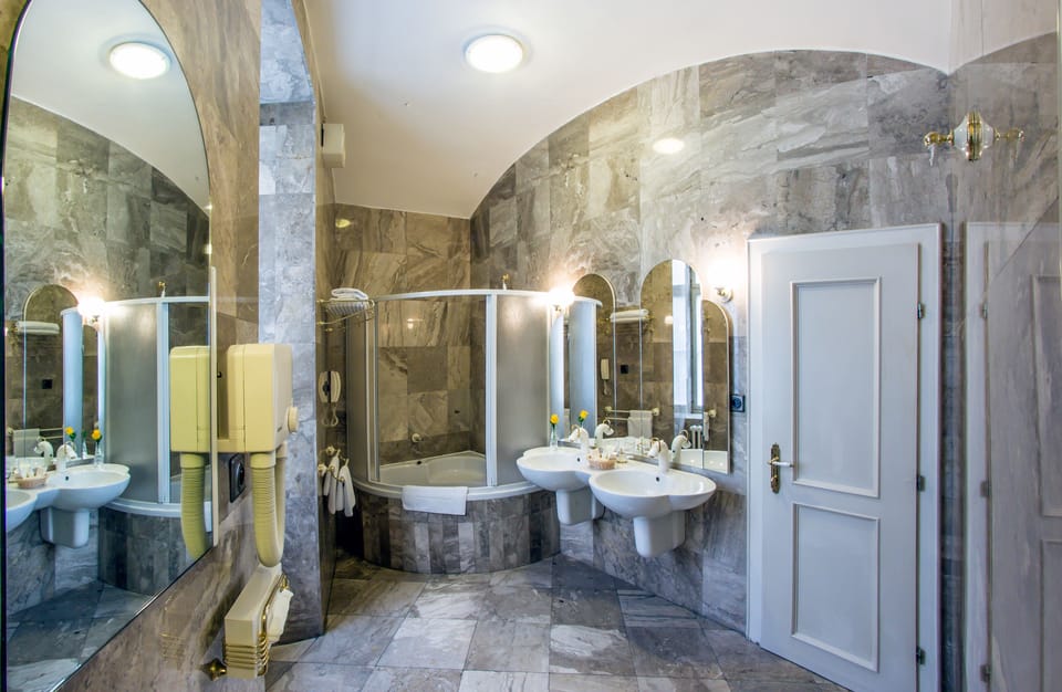 Designer toiletries, hair dryer, bathrobes, bidet