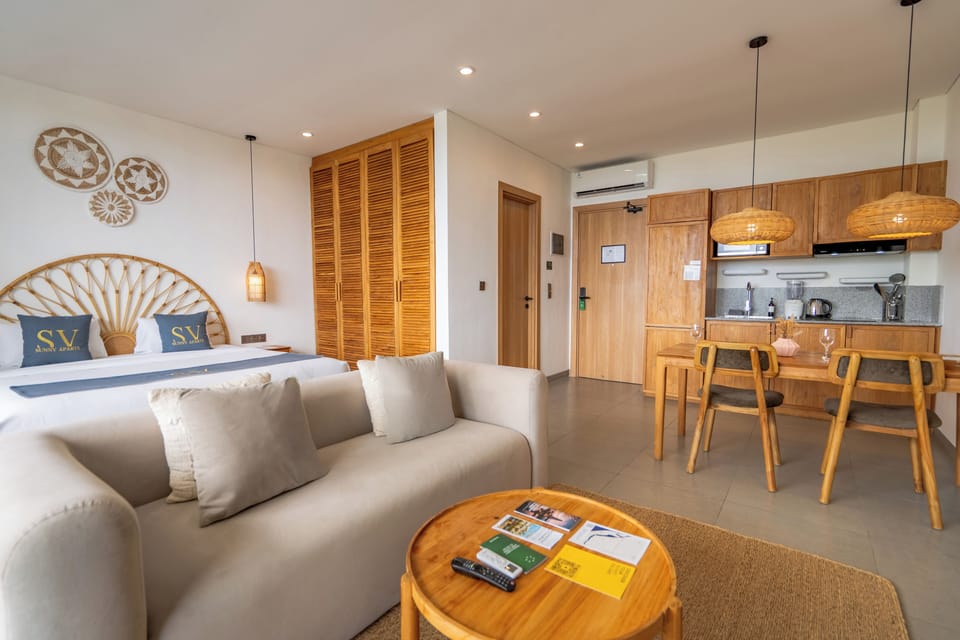 Signature Suite, Balcony | Living room | 65-inch Smart TV with digital channels