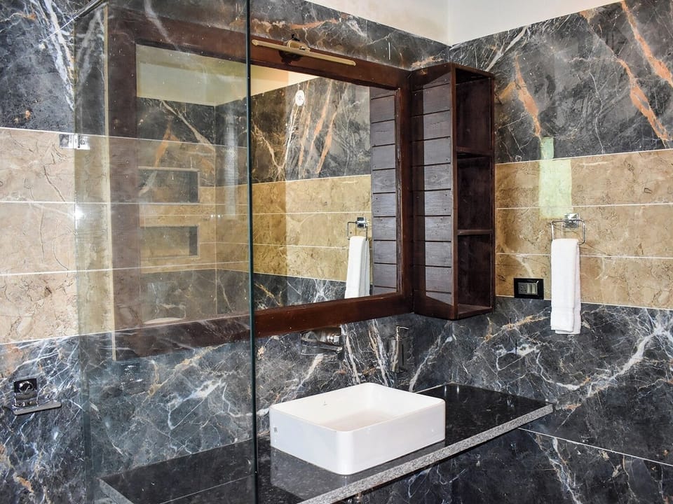 Family Cottage, Balcony, Garden View | Bathroom | Hair dryer, slippers, towels, soap