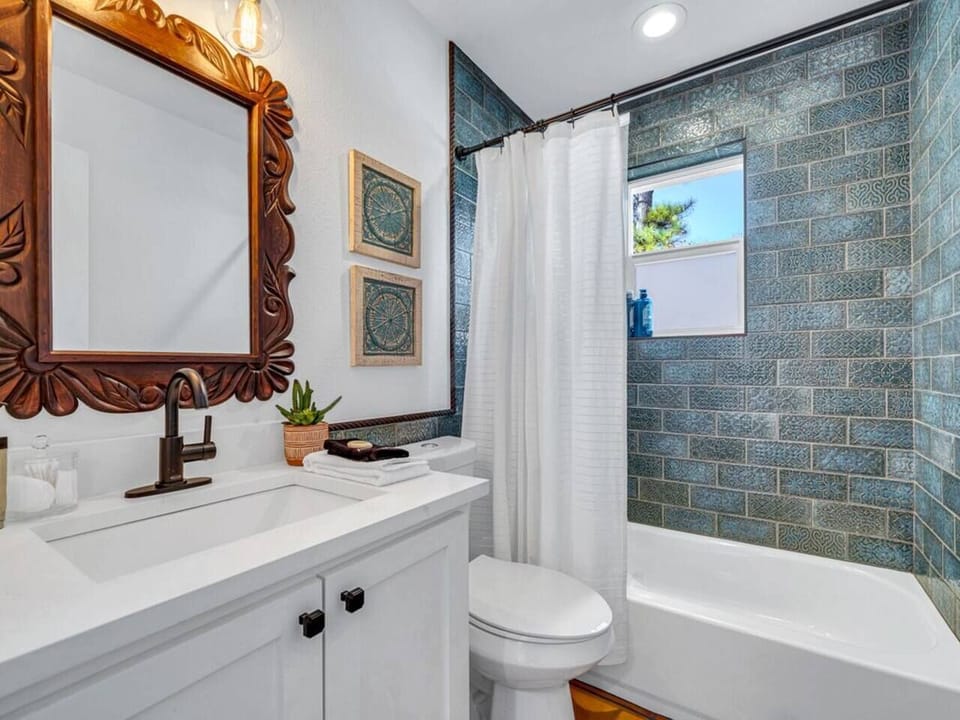 Hall Bath with tub shower combo.  Stocked with shampoo and soaps for your use.  