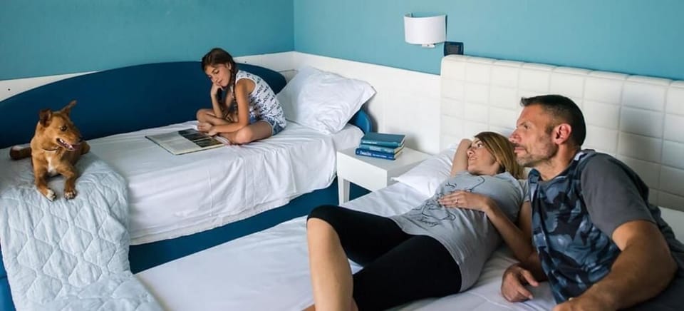 Classic Triple Room, Balcony | In-room safe, blackout drapes, free WiFi