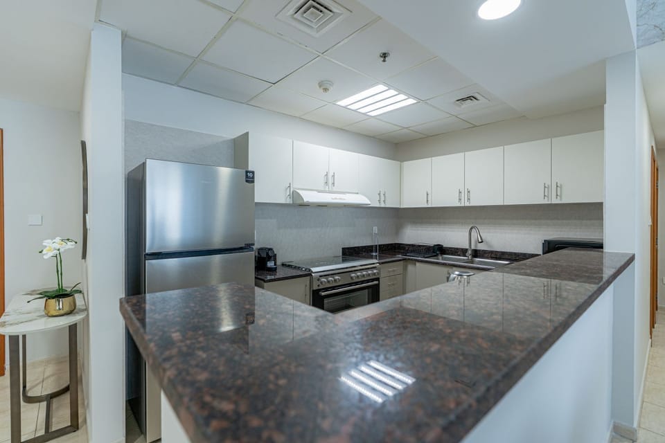 Luxury Apartment, Balcony, City View | Private kitchen | Coffee/tea maker, electric kettle, toaster