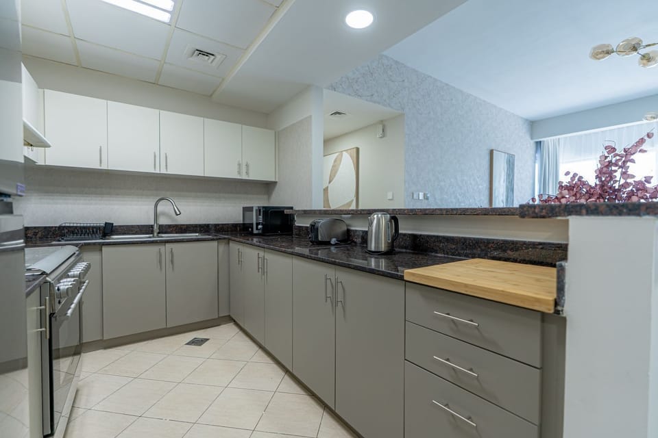 Luxury Apartment, Balcony, City View | Private kitchen | Coffee/tea maker, electric kettle, toaster
