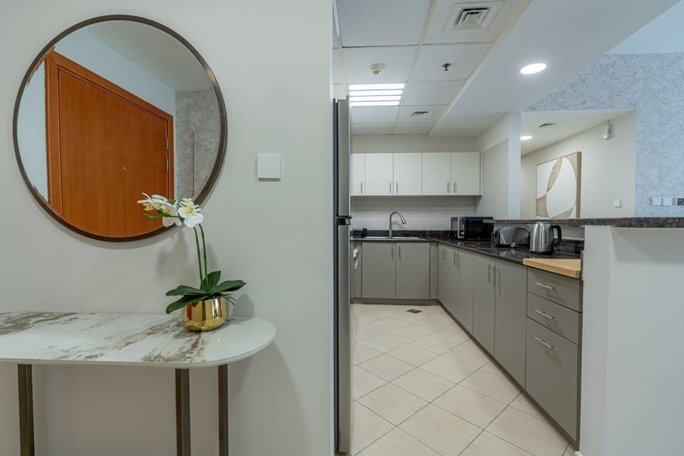 Luxury Apartment, Balcony, City View | Living area | 65-inch Smart TV with digital channels, Netflix, streaming services