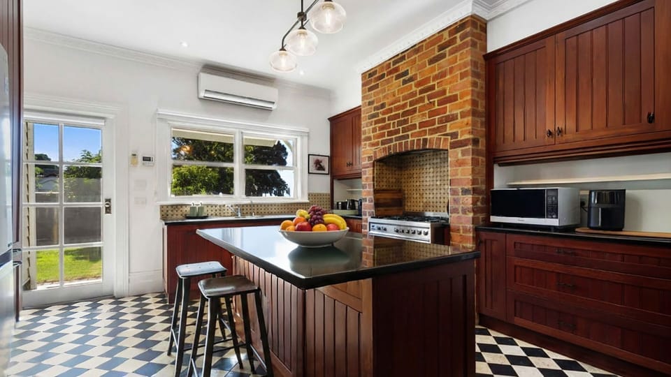 Charming Heritage Retreat | Kitchen | Microwave | Gas cooktop | Air conditioning