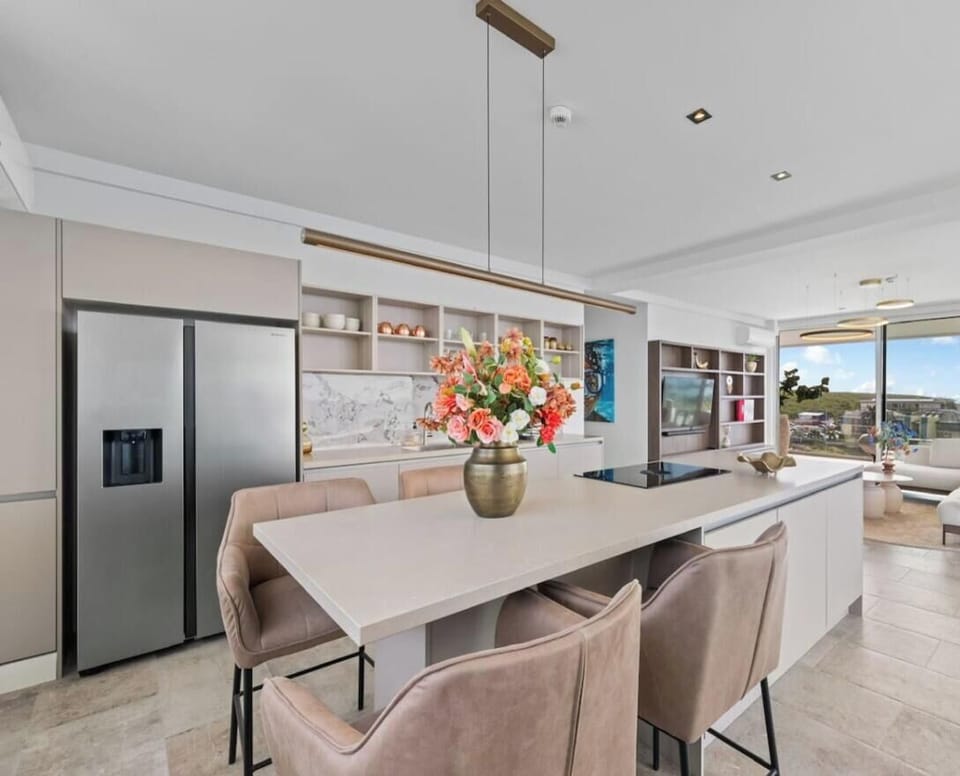 The fully equipped kitchen has everything you need for simple meals or casual dining.
