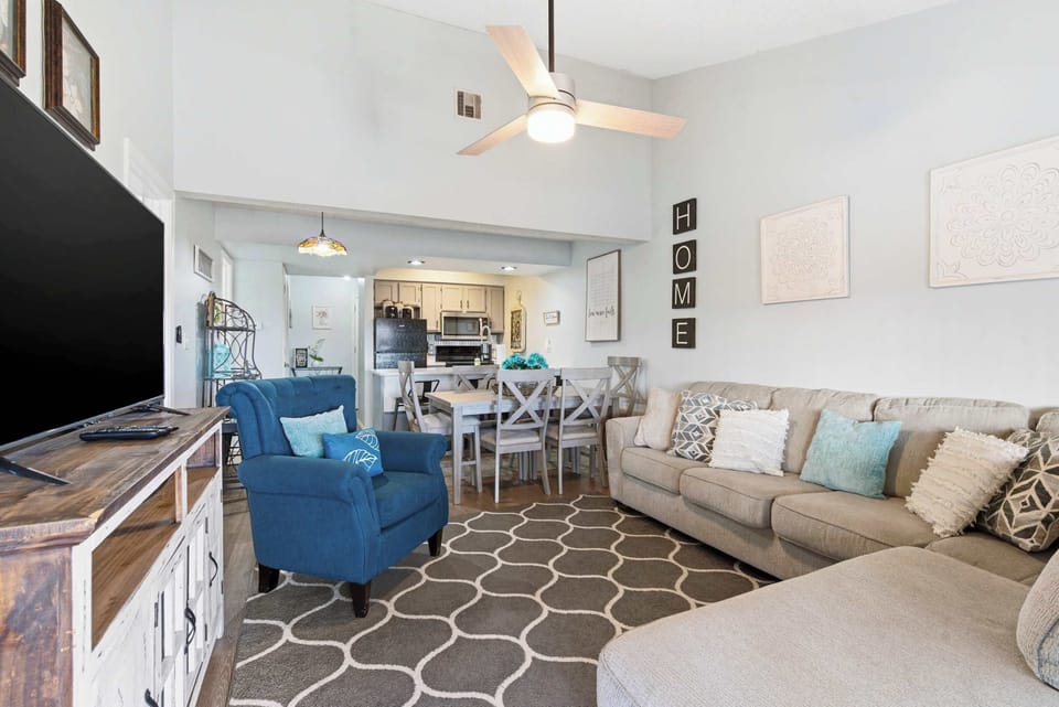 Unwind in the inviting living room & stream your favorites on the smart TV​