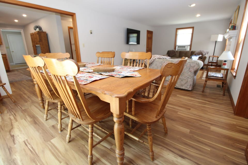 Dining Table, Kitchen to Left, TV room to Right