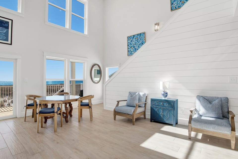 Enjoy games or coffee around the small table in the living room