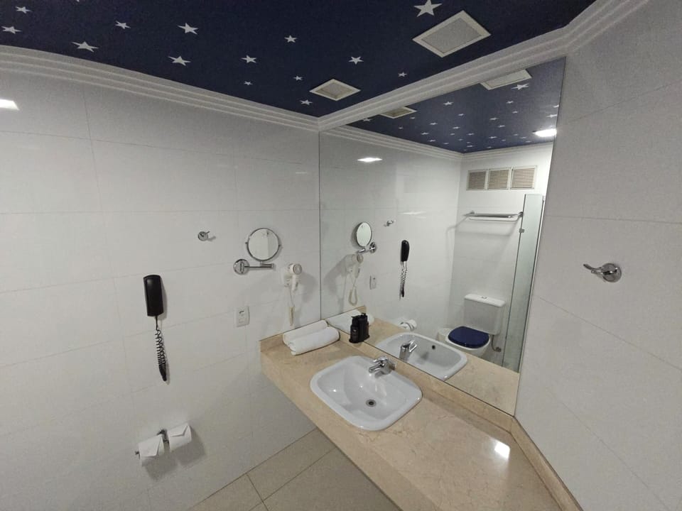 Shower, eco-friendly toiletries, hair dryer, towels
