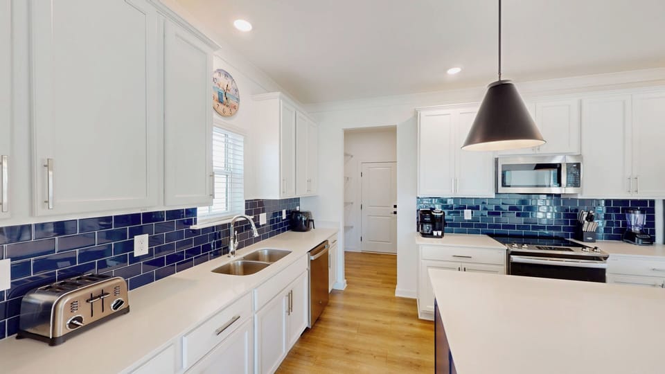 House, Multiple Beds, Patio, Garden View (Wolf Bay Hangout) | Private kitchen | Coffee/tea maker