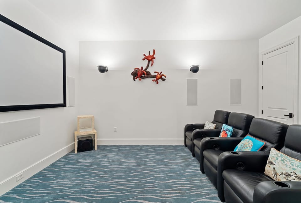 Relax with a movie in the comfort of 2110’s private theater room.