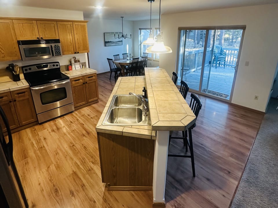 Fully stocked kitchen with island seating 