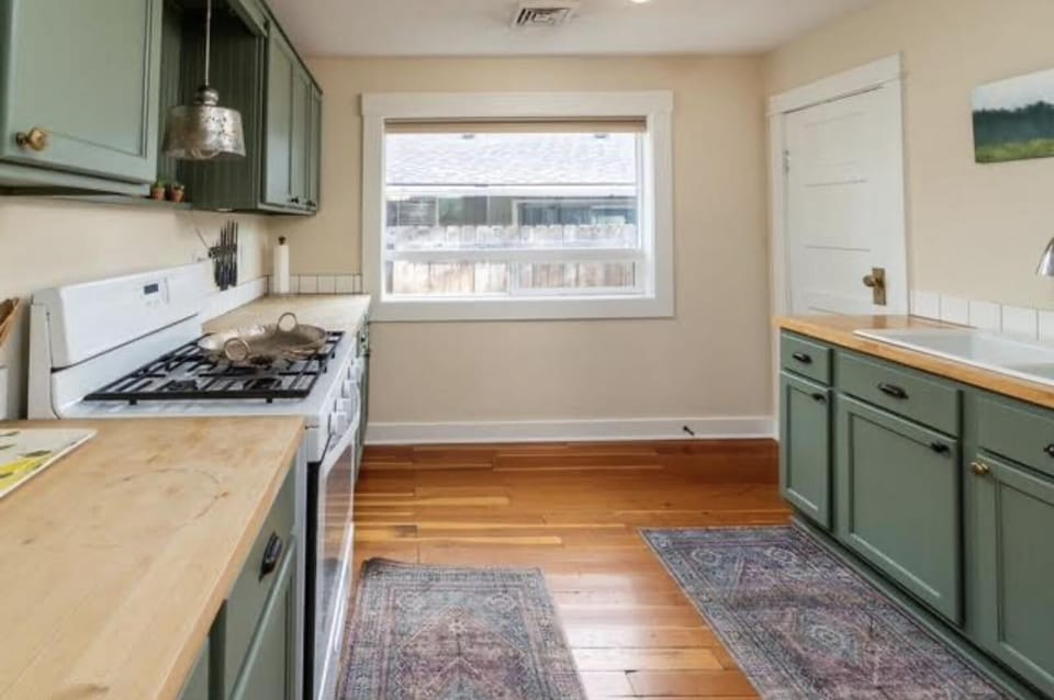 A petite microwave is located in the coffee room, along with a Ninja 3 in 1 espresso machine