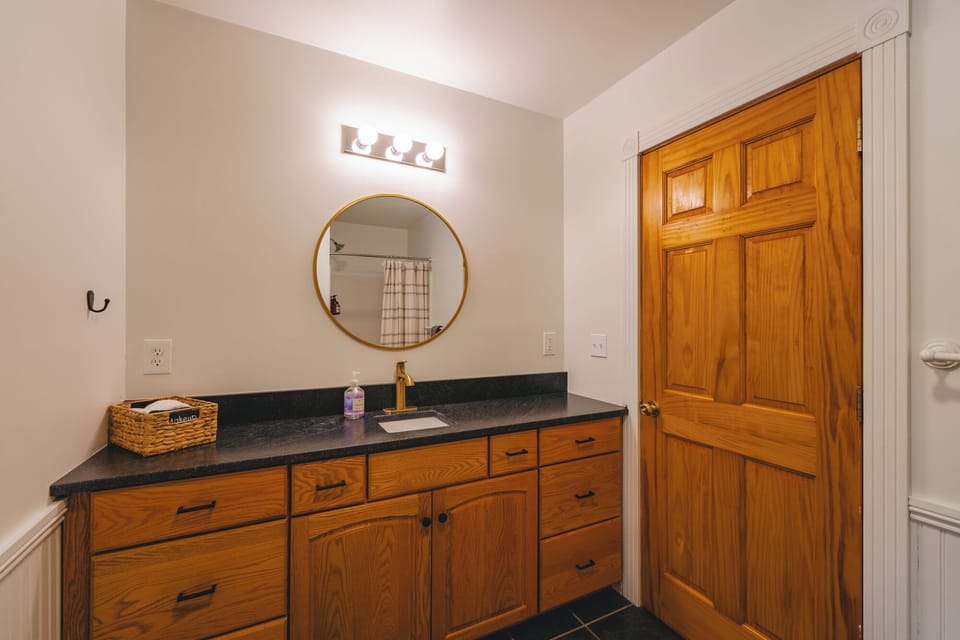There is one bathroom on the main floor with a shower