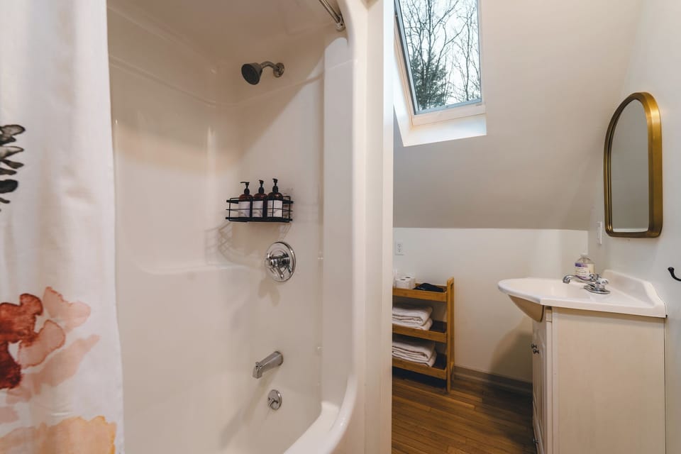 The second bathroom upstairs has a combination shower/tub