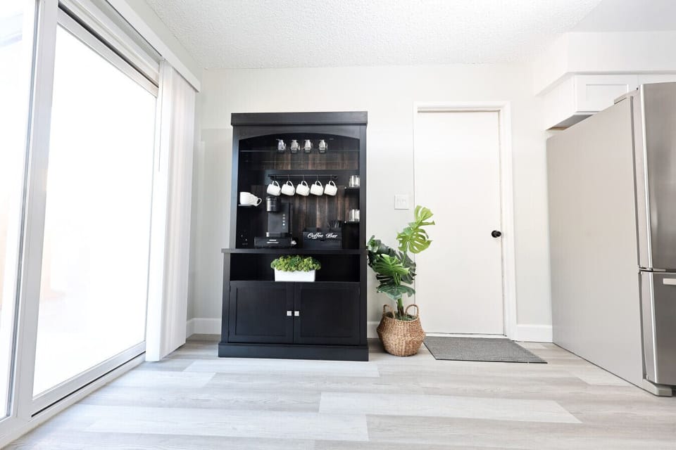 Start your mornings in the dedicated coffee area ☕ featuring a Keurig machine and a starter coffee kit with pods, creamers, and everything you need to kick off the day.