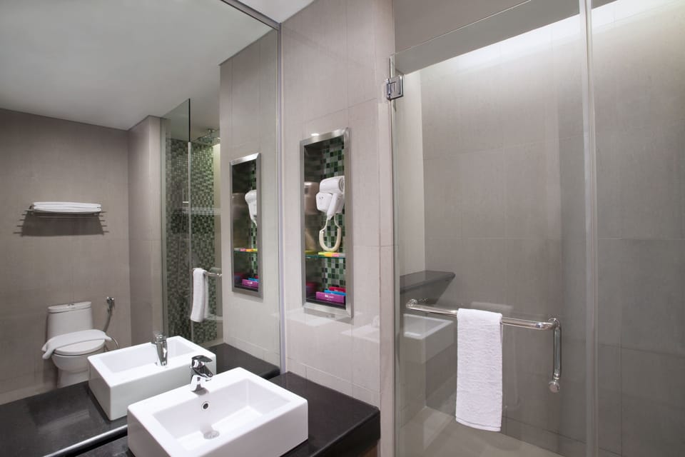 Shower, eco-friendly toiletries, hair dryer, slippers