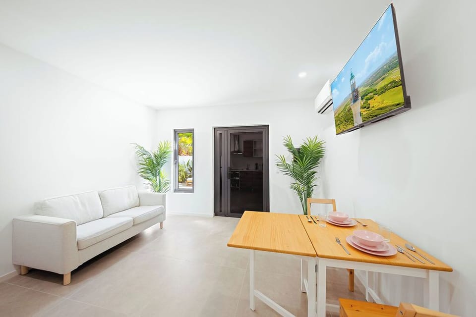 Enjoy your meals in this cozy and bright dining space, perfect for intimate gatherings or casual breakfasts. Designed for comfort and simplicity, it’s an inviting spot to share great food and even better company during your stay.