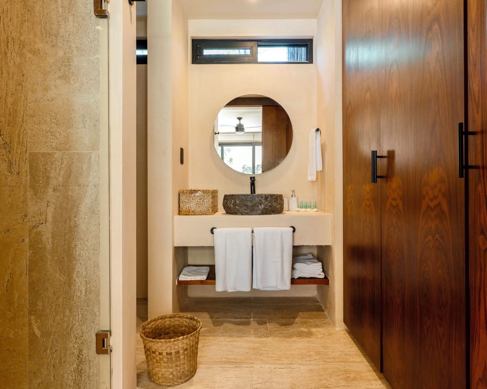 Deluxe Studio | Bathroom | Shower, towels, soap, toilet paper