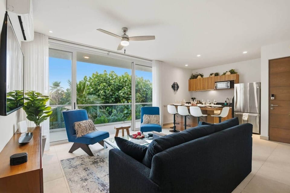 For added comfort, the living room includes AC, a ceiling fan, and room-darkening shades—perfect for keeping the space cool, relaxing, and comfortable at any time of day.