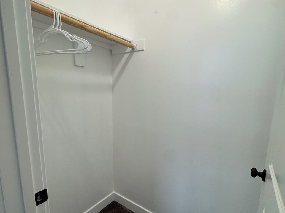 Closet in bedroom 2 with bunk beds
