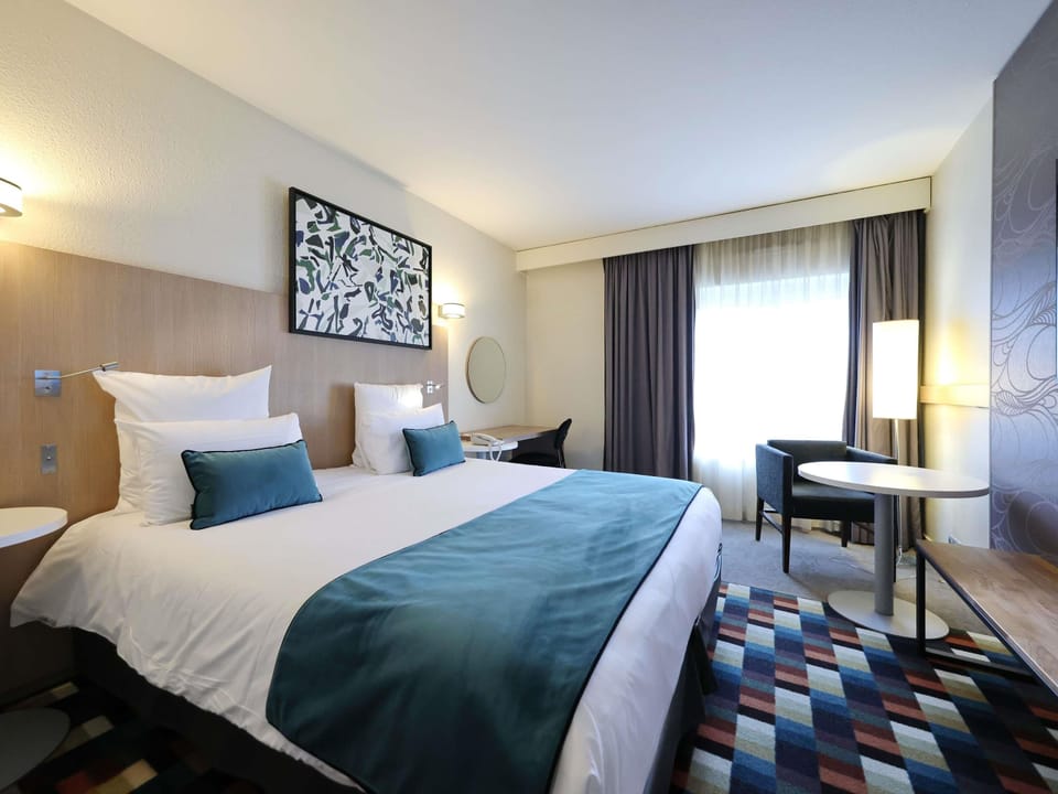 Premium bedding, Select Comfort beds, desk, blackout drapes