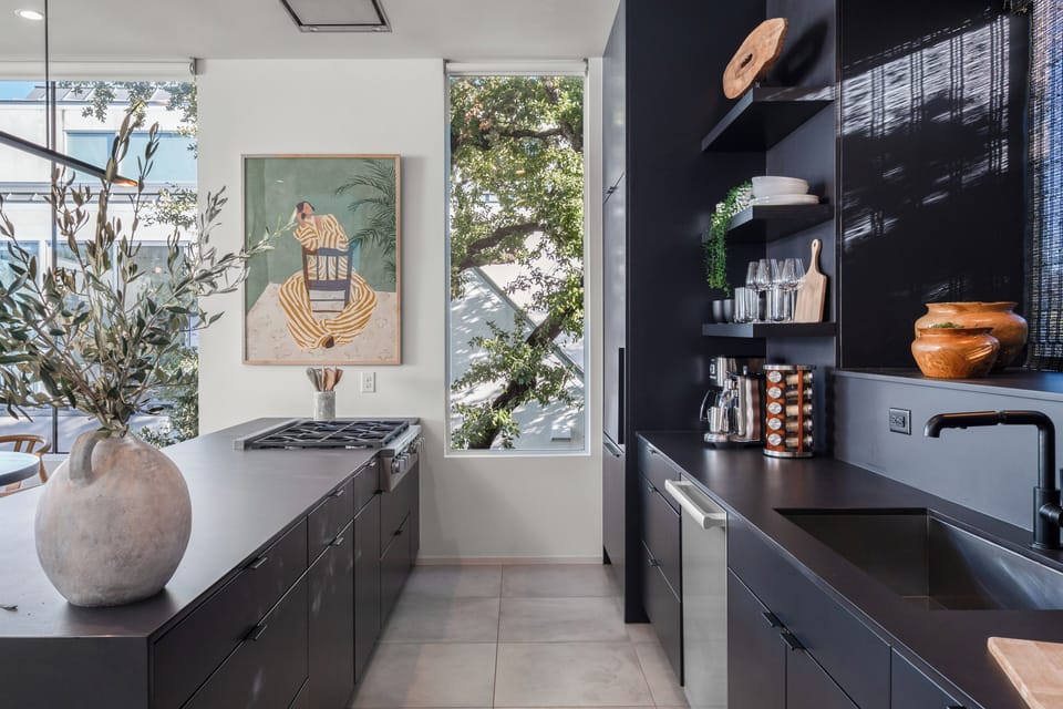 Fully equipped kitchen with modern appliances.