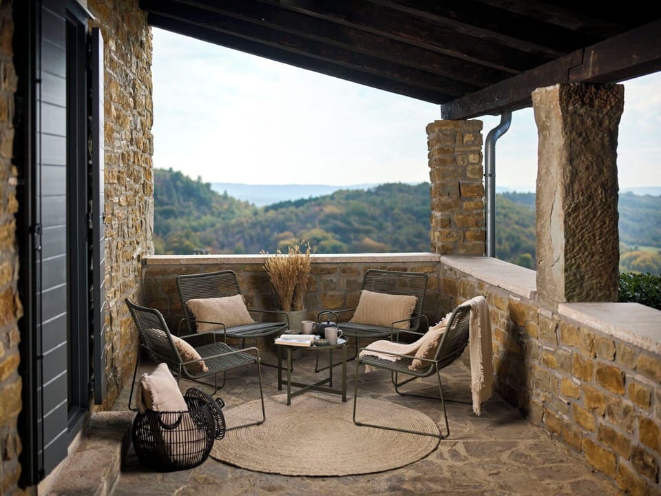 Furniture, Outdoor Furniture, Chair, Stone Wall, Flagstone, Outdoor Table, Natural Material, Shade, Hardwood, Coffee Table