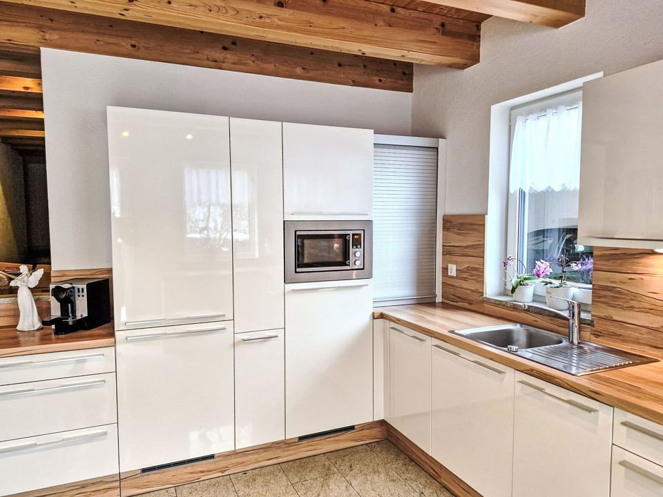 Kitchen, Kitchen Appliance, Flooring, Countertop, Interior Design, Major Appliance, Wood, Cabinetry, Furniture, Floor