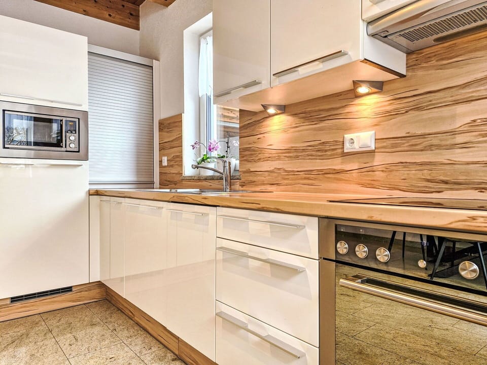 Flooring, Countertop, Wood, Kitchen, Cabinetry, Interior Design, Kitchen Appliance, Wood Flooring, Floor, Furniture