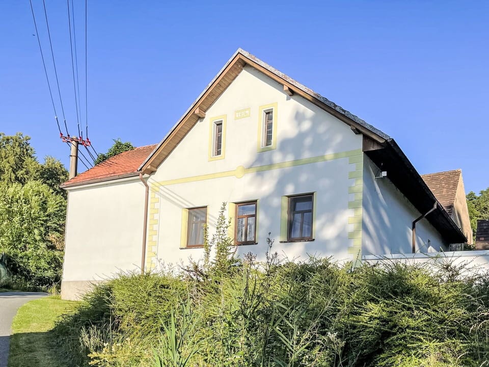 Building, Window, House, Home, Residential Area, Roof, Cottage, Facade, Shrub, Human Settlement
