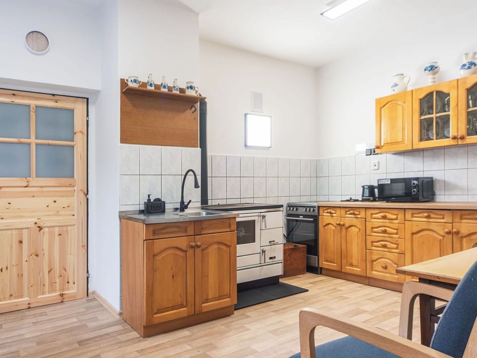 Flooring, Wood, Floor, Cabinetry, Major Appliance, Interior Design, Kitchen, Room, Kitchen Appliance, Cupboard