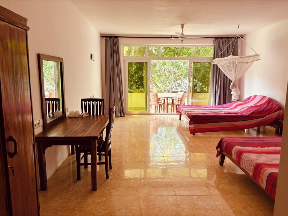 Deluxe Triple Room, Terrace | Blackout drapes, cribs/infant beds, free WiFi, bed sheets
