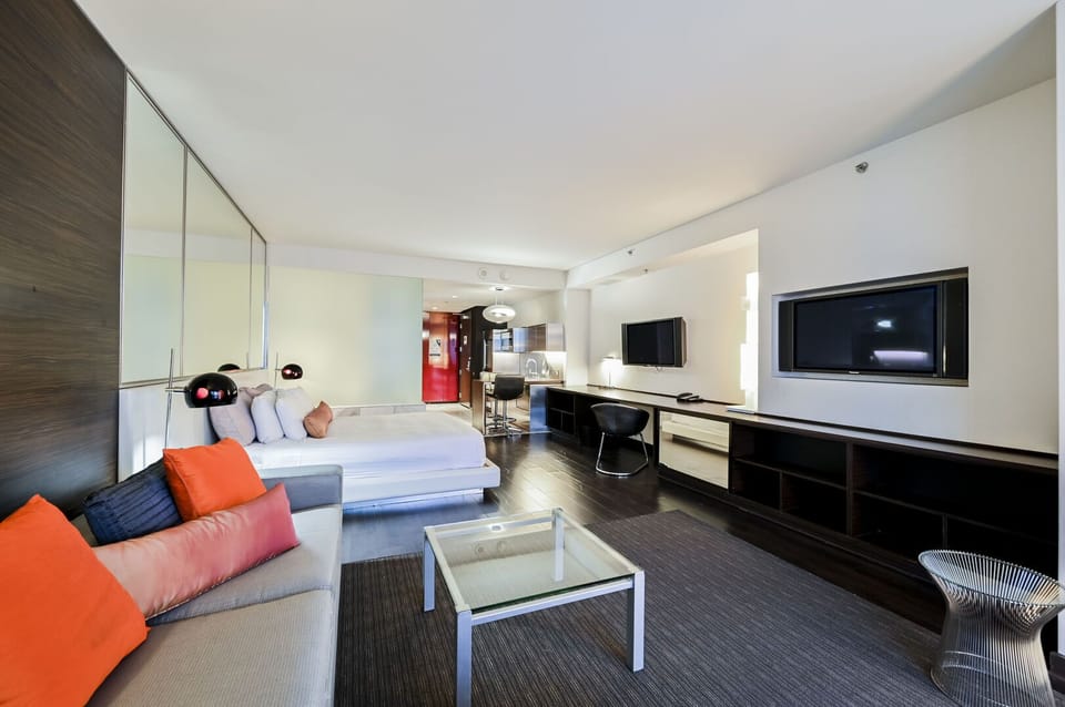 Living Area with 2 Flat Screen TVs