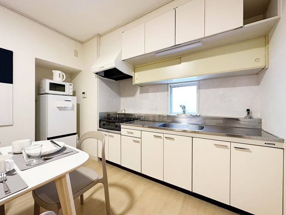 Japanese-style Apartment, Balcony | Private kitchen | Electric kettle