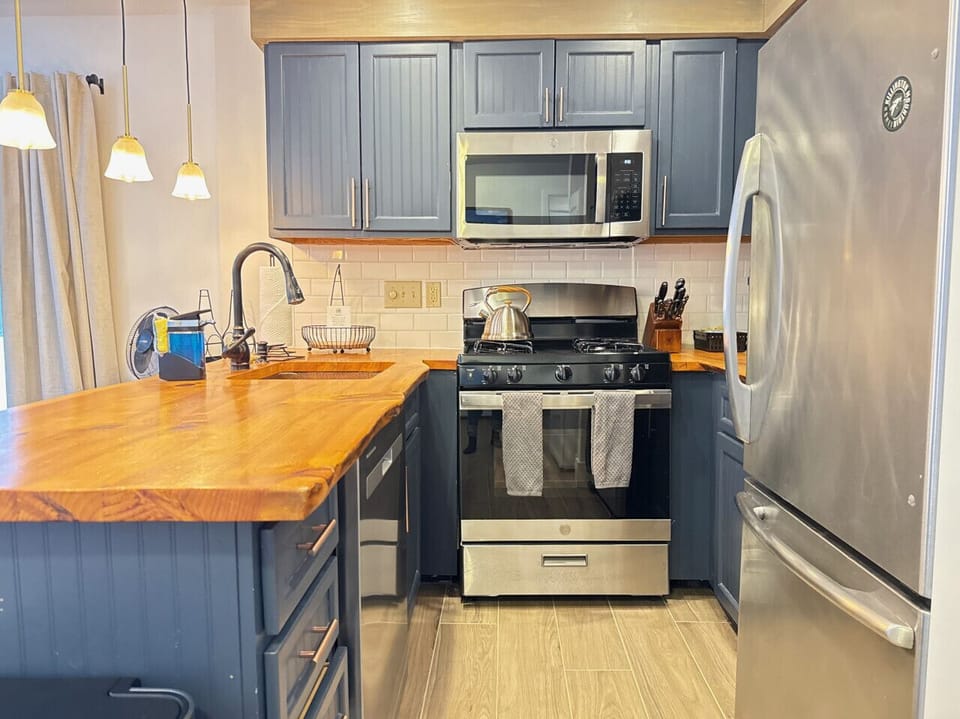 Experience the comfort of home with our fully equipped kitchen.