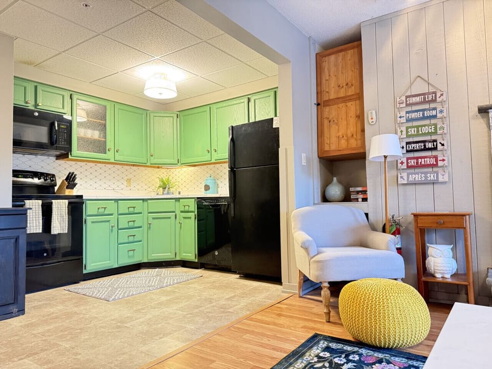 Kitchen includes all essential appliances and tools.