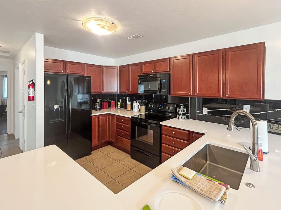 Your fully equipped kitchen provides plenty of space for preparing meals.