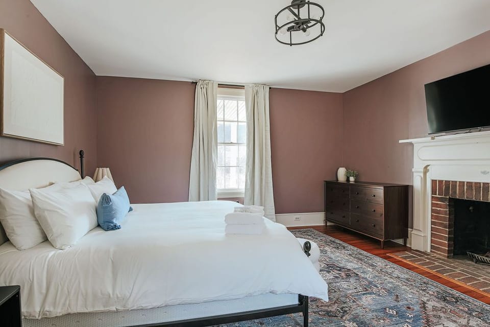 Spacious bedroom with king bed and Smart TV