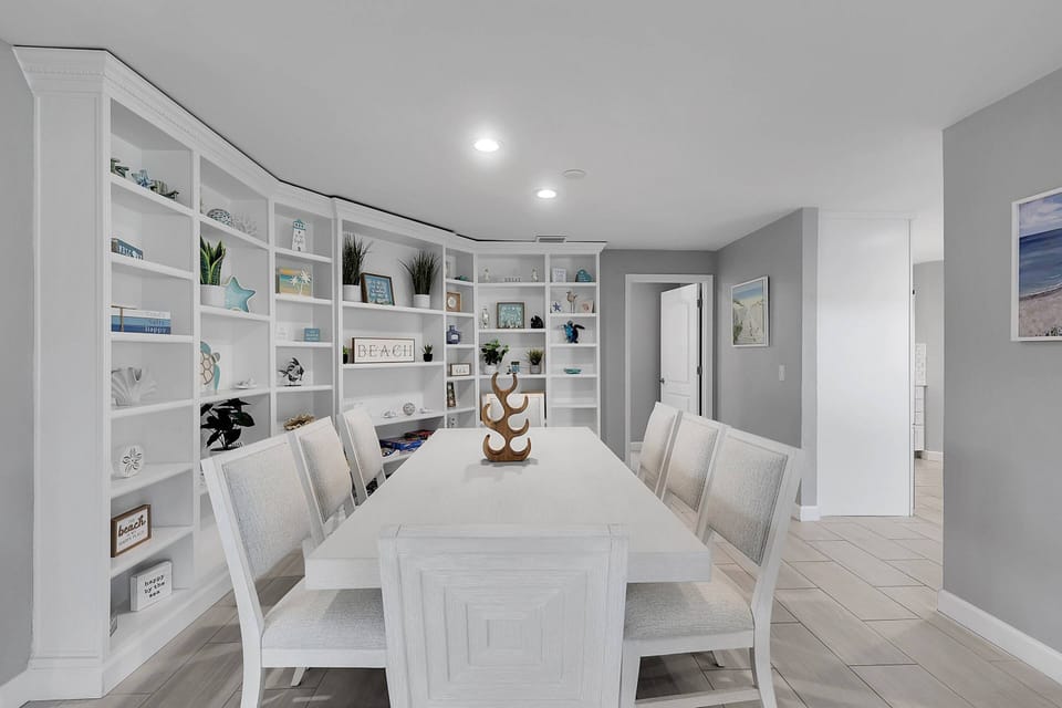 Gather in the inviting dining space with seating for 8, perfect for shared meals, game nights, or memorable conversations with family and friends.